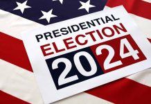 Presidential Election 2024 sign on American flag background.