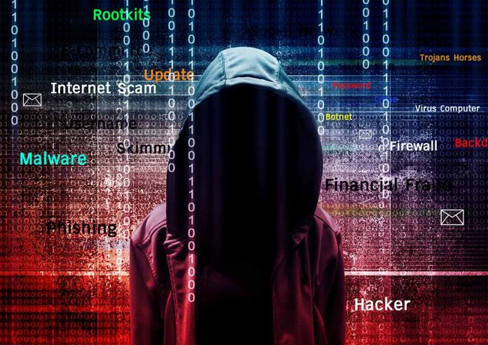 Hooded figure with cybersecurity terms and binary code background.