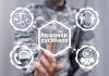 Person pressing Prisoner Exchange button on virtual interface