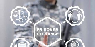 Person pressing Prisoner Exchange button on virtual interface