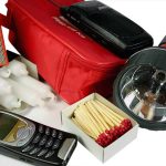 Emergency kit with flashlight matches phone and candles