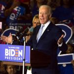 Man speaking at Biden campaign rally