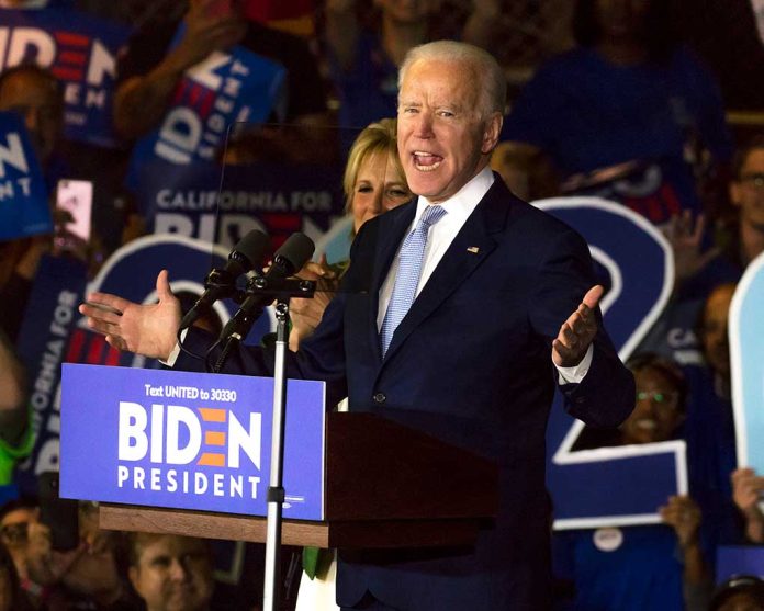 Man speaking at Biden campaign rally