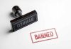 "Banned" stamp and rubber stamp on white background.