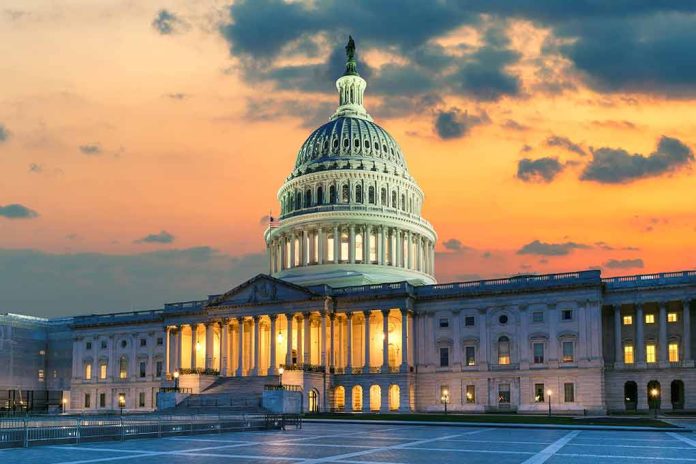 Capitol building at sunset with cloudy sky