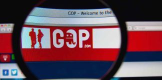 Magnifying glass over GOP website logo.