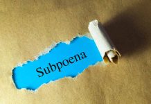 Subpoena text revealed through torn paper.