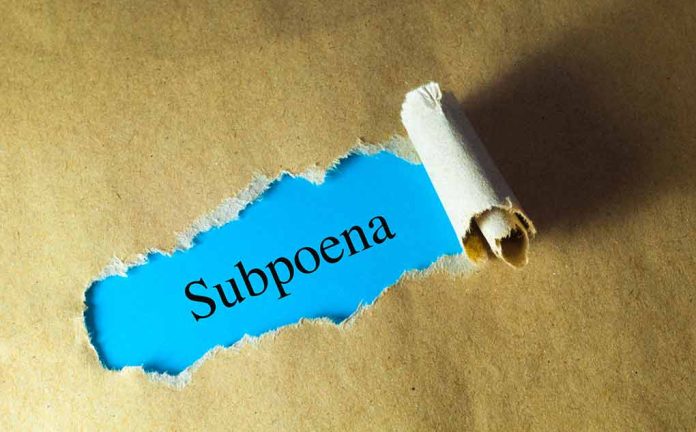 Subpoena text revealed through torn paper.