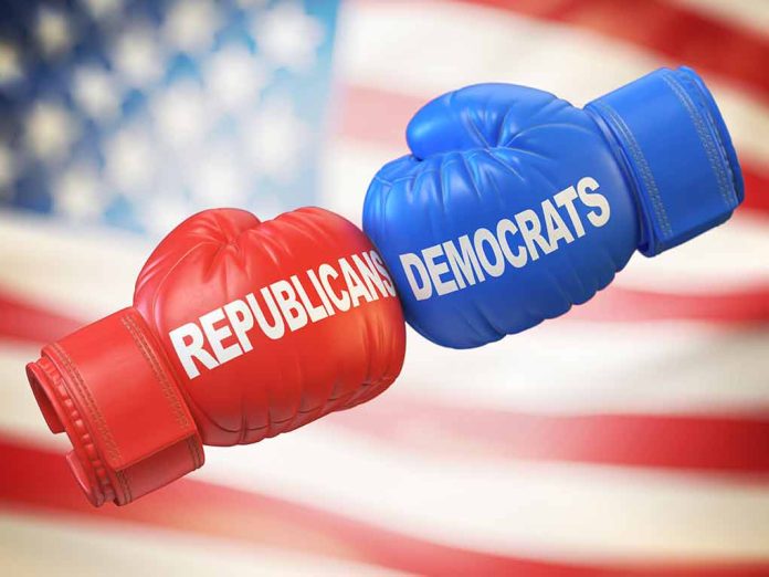 1663130575 featured image Red and blue boxing gloves with political party names.