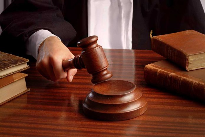 2080475 featured image Judge gavel on desk with books