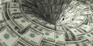 Hundred-dollar bills swirling into a financial vortex
