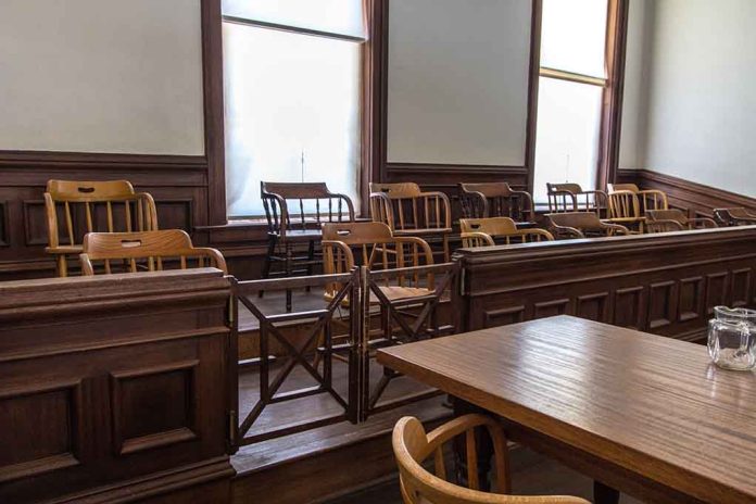1403556146 featured image Empty jury box and table in courtroom