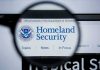 Magnifying glass showing Homeland Security website