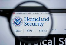Magnifying glass showing Homeland Security website