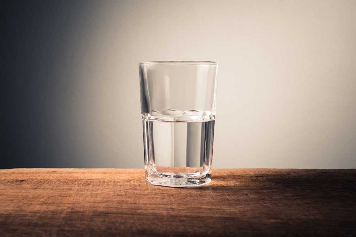 1695951943 featured image Glass of water on wooden surface