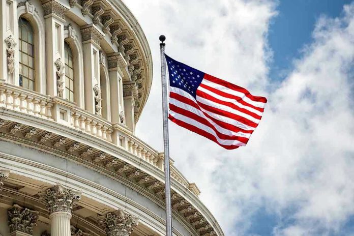 267261662 US flag in front of Capitol building dome