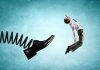 Man gets kicked by oversized shoe on spring