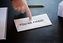 Envelope with YOURE FIRED! and pointing finger.