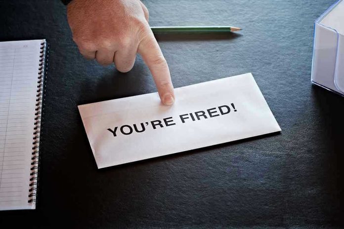 70617409 Envelope with YOURE FIRED! and pointing finger.