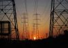 Transmission towers at sunset.