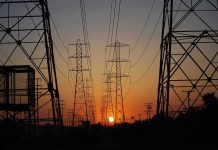 Transmission towers at sunset.