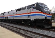 Amtrak locomotive parked at a railway station