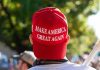 Person wearing a red Make America Great Again hat