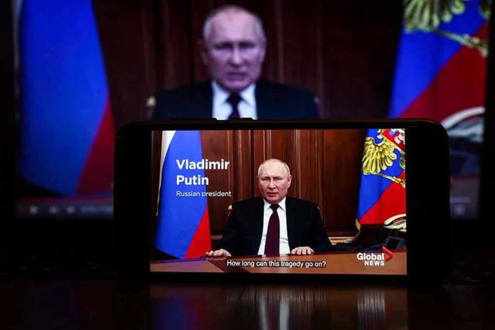 Man speaking on screen with Russian flag background