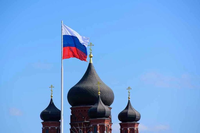 753321622 Russian flag next to church domes