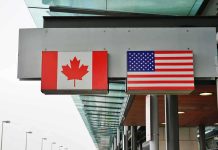 Trump SLAMS Canada: Shocking Reagan Ad Fallout Canadian and American flags displayed at a border crossing
