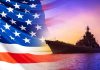 US Military’s War on Drugs Escalates American flag overlaying warship at sunset.