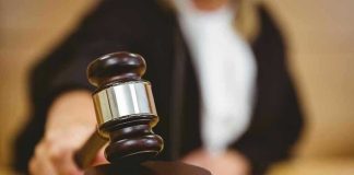 Judge striking gavel in a courtroom