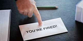 Envelope with YOURE FIRED! and pointing finger