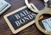 Bail Reforms Backfire: Chaos in Blue Cities Bail bonds sign with handcuffs and stacks of cash
