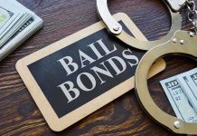 Bail Reforms Backfire: Chaos in Blue Cities Bail bonds sign with handcuffs and stacks of cash