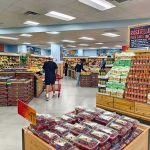 Secret Recording EXPOSES Campbell Exec’s Elitism Interior of a grocery store with customers shopping for fresh produce