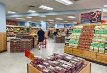 Secret Recording EXPOSES Campbell Exec’s Elitism Interior of a grocery store with customers shopping for fresh produce