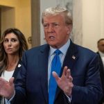 Congress Moves Against Trump–National Security at Stake Man speaking with hands raised, woman and security behind.