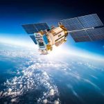 Space Force Sounds the Alarm on Unseen Activity Satellite orbiting Earth with moon in background.