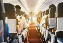 Is Flying Safe Anymore? This Incident Says Otherwise Passengers seated inside an airplane cabin.