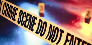 Crime scene tape with do not enter text.