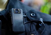 Body camera attached to a black uniform.