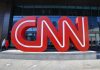Viral Claim About Scott Jennings Falls Apart Large red CNN sign outside building entrance.