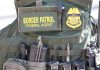 ICE Photo Rage Turns UGLY Fast Border Patrol vest with gear and communication equipment.