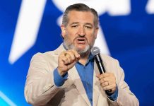 Cruz Flees Storm Warnings, Critics Fume Man speaking passionately into a microphone on stage.