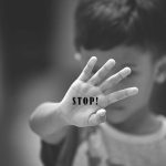 Child Predator Gets SLAP On Wrist! Child holding up hand with STOP! written on palm.
