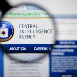 Magnifying glass over Central Intelligence Agency webpage.