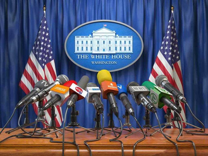 1186435138-1 Multiple microphones at White House press briefing podium.