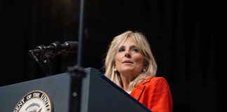 Washington in Shock: Health Concerns Spark Questions Person speaking at podium with Vice President seal.