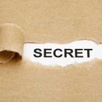 The Story Isn’t Simple: Big Pharma’s Peptide Secret A torn piece of brown paper revealing the word SECRET underneath